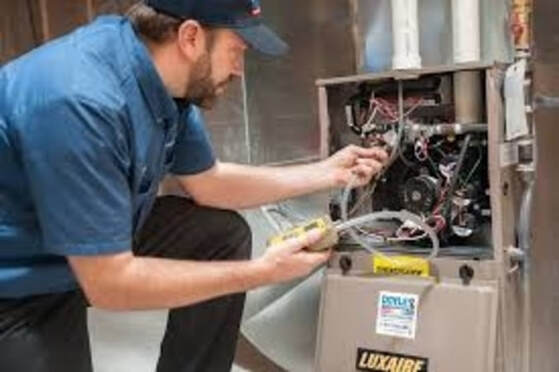 Repair Man fixing furnace
